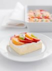 Fruit salad on cheesecake — Stock Photo