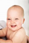 Close up of baby girls laughing face — Stock Photo