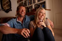 Couple drinking wine at home — Stock Photo