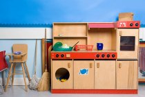 Play area against blue wall indoors — Stock Photo
