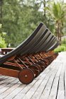 Lawn chairs lined up — Stock Photo