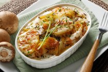Potato casserole in dish — Stock Photo