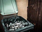 Aluminum cans in recycling bin — Stock Photo