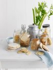 Jars of crackers and flatbreads — Stock Photo