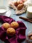 Muffins with pears and milk — Stock Photo