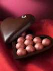 Chocolates in decorative box — Stock Photo