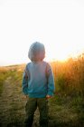 Boy wearing hooded top back to front — Stock Photo