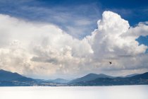 Clouds over snowy landscape — Stock Photo