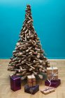 Christmas tree with presents underneath — Stock Photo