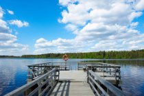 Wooden dock in lake — Stock Photo