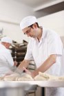 Chef baking in kitchen, selective focus — Stock Photo