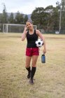 Soccer player in field — Stock Photo