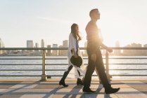 Three mid adult friends strolling on waterfront, New York, USA — Stock Photo