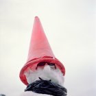 Bottom view of Snowman with red traffic cone — Stock Photo