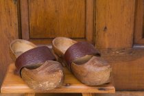 Pair of old vintage Wooden clogs — Stock Photo
