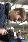 Student at work in shop class, selective focus — Stock Photo