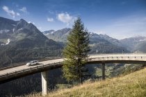 Car on elevated highway to Gotthard Pass, Switzerland — Stock Photo