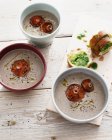 Bowls of mushroom cream soup — Stock Photo