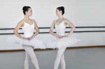 Ballet dancers posing together in studio — Stock Photo