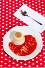 Panna cotta with strawberry jam — Stock Photo