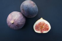 Top view of whole and half figs — Stock Photo