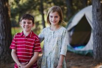 Children standing together at campsite — Stock Photo
