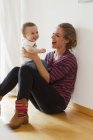 Mother playing with baby boy — Stock Photo