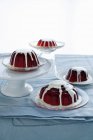 Plates of jello pudding with cream — Stock Photo