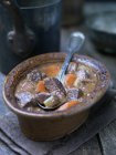 Casserole dish with daube of beef and carrots — Stock Photo