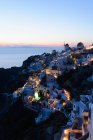Vue du coucher du soleil à Oia, Santorin, Grèce — Photo de stock