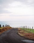 Paved road on rural cliff — Stock Photo