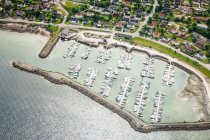Aerial view of village buildings and harbor — Stock Photo
