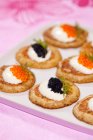 Blini with cheese and caviar — Stock Photo