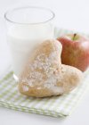 Bread roll and apple with milk — Stock Photo