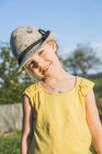 Portrait of young girl in alpine hat — Stock Photo