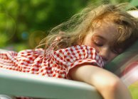 Portrait of Girl sleeping outdoors — Stock Photo