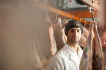 Portrait of butcher wearing hairnet — Stock Photo