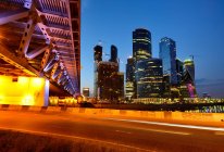 View of skyscrapers and Dorogomilovsky bridge at night, Moscow, Russia — Stock Photo