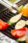 Vegetables cooking on grill — Stock Photo