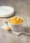 Carrot, swede and potato mash in bowl — Stock Photo