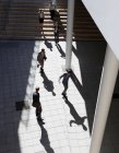 Business people walking in courtyard — Stock Photo