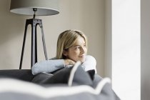Portrait of mid adult woman looking away — Stock Photo
