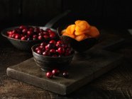Cranberries and dried apricots — Stock Photo
