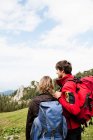 Couple watching countryside at mountains — Stock Photo