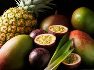 Tropical fruits nestled together — Stock Photo
