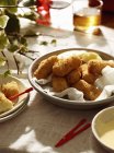 Salted cod croquettes with lemon and beer — Stock Photo