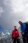 Hikers admiring glacial landscape — Stock Photo