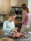 Mother and daughter baking together, selective focus — Stock Photo