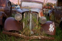 Close up of vintage car in scrap yard — Stock Photo