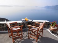 Breakfast set up with sea view — Stock Photo